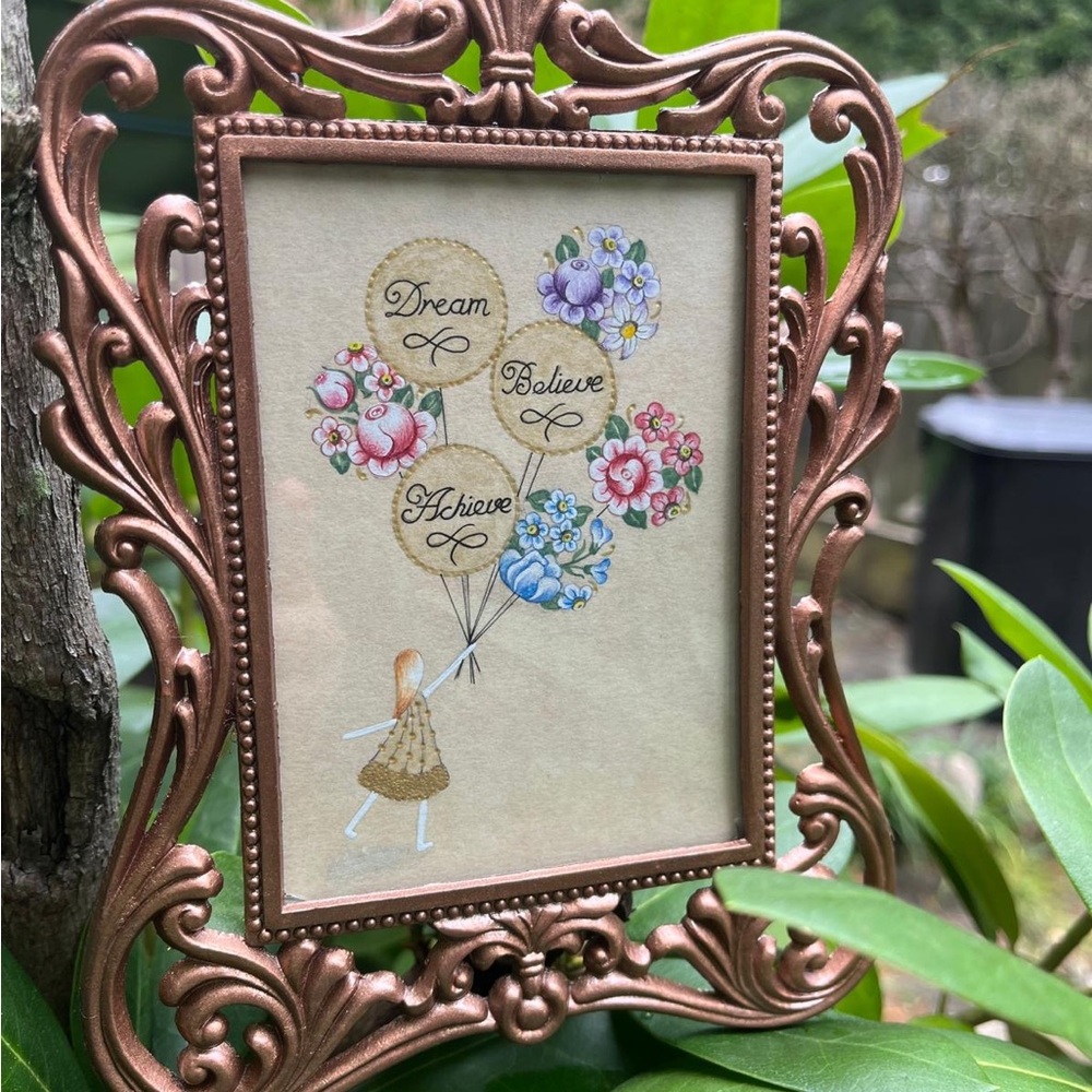 Ornate Bronze Frame with Inspirational Art